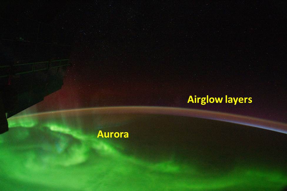 Figure 4. Photograph taken from International Space Station (ISS) showing aurora and airglow layers.  Courtesy NASA.